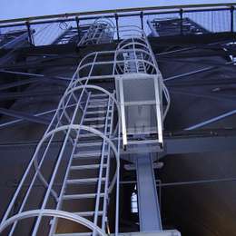 JOMY fire escape ladder. The most economic ladder is the fixed ladder with safety hoops according to regulations. For more then 40 years JOMY makes those ladders and adapts them to each specific situation.