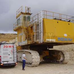 Counter balanced ladder in a open surface mine